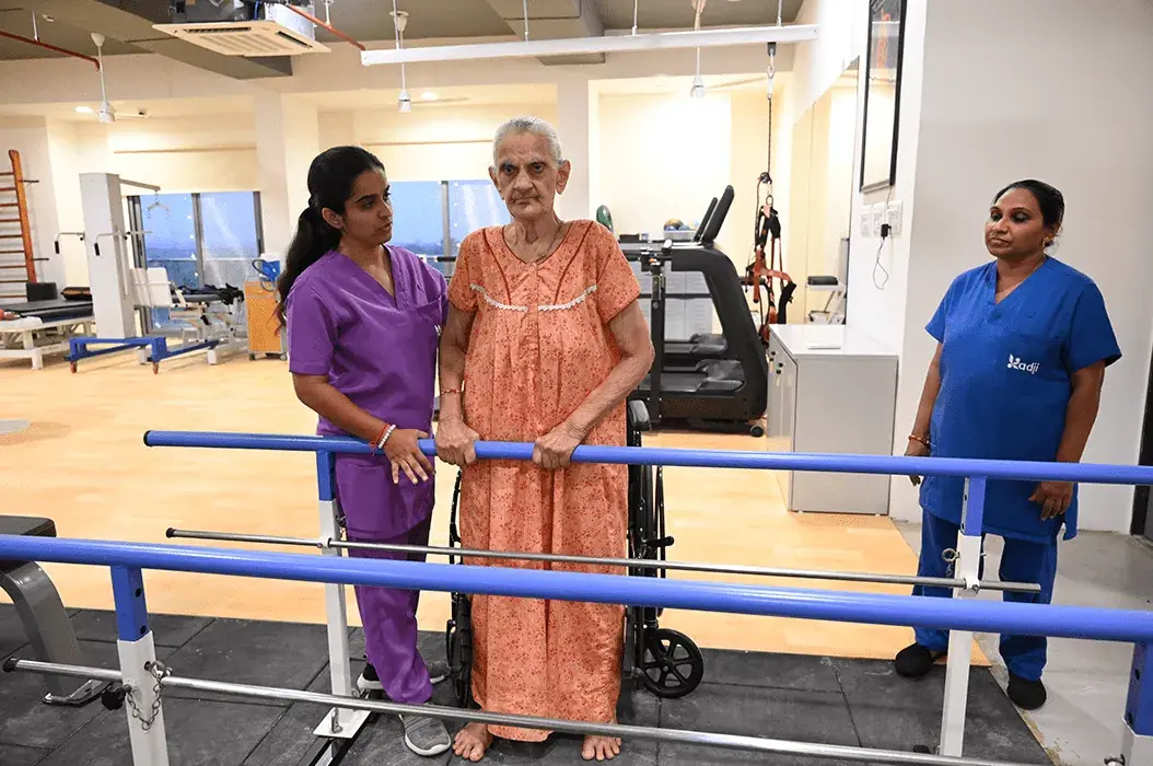 Kadji therapist working with a patient during a rehabilitation session